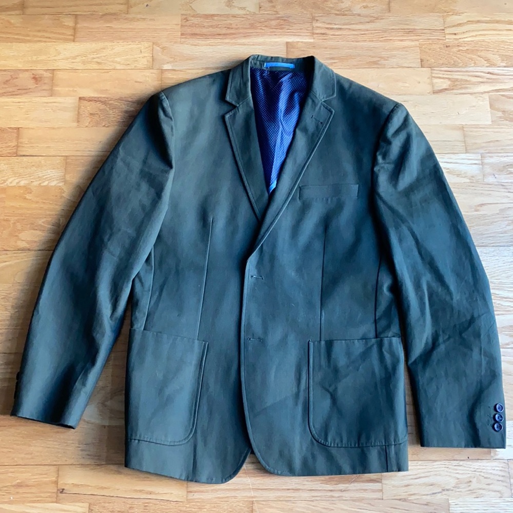 Olive green men’s blazer by Combatant Gentleman.